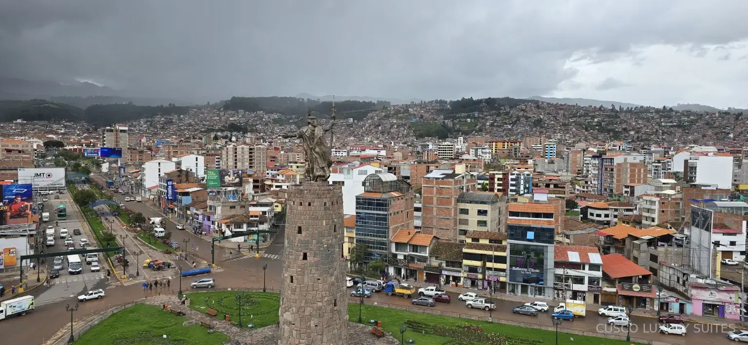 Panoramic daytime view of Cusco and the Pachacútec Monument from AYLLU SUITE