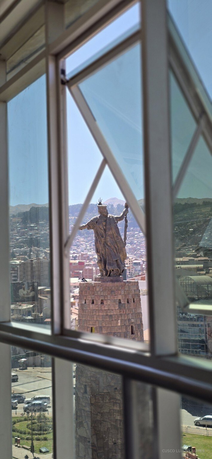 Pachacútec Monument framed by an open window in SUMAQ SUITE